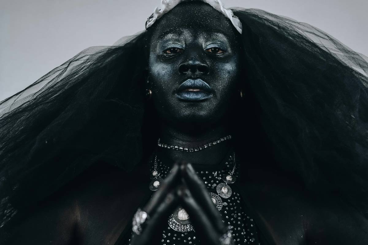 Infographic showing layers of professional fantasy makeup: primer, sealer, paint, setting powder, final fixative
